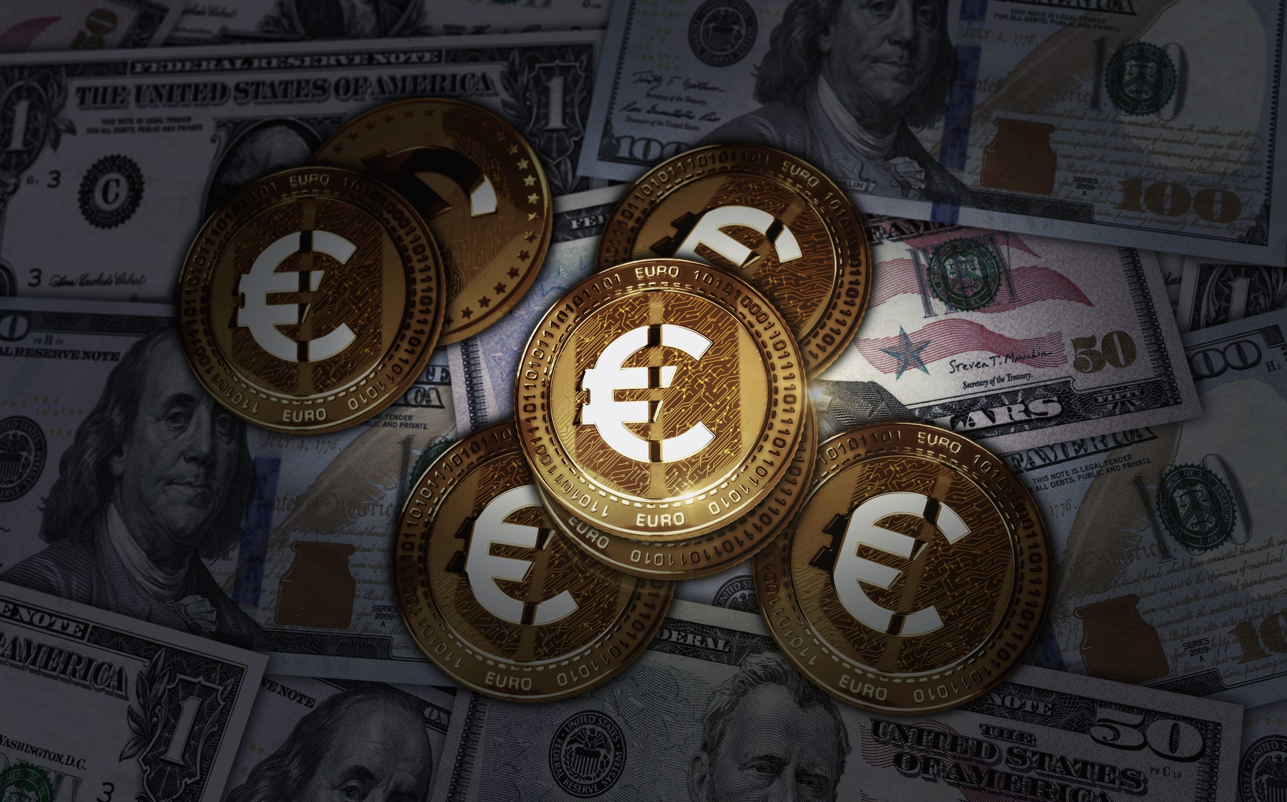 Pile of gold euro coins on a background of scattered U.S. dollar bills.