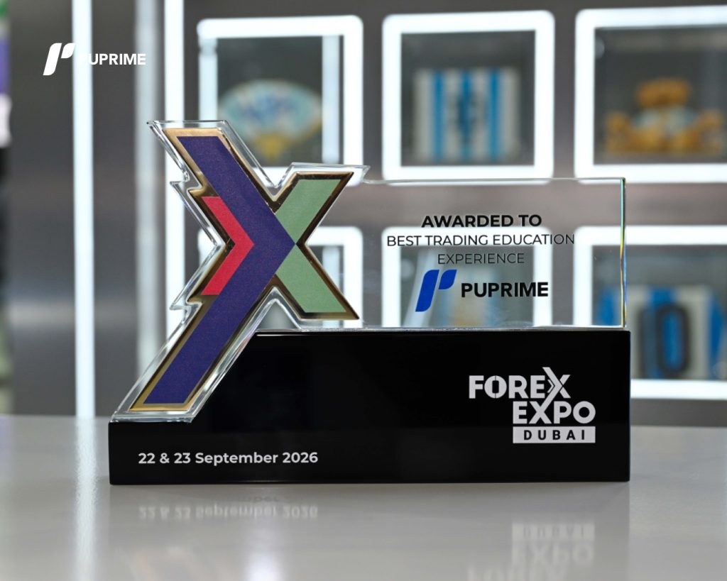 8 – PU Prime | More Than Trading Crystal award with a large multicolored X, noting 'Awarded to Best Trading Education Experience' for PuPrime at Forex Expo Dubai, Sept 22–23, 2026.